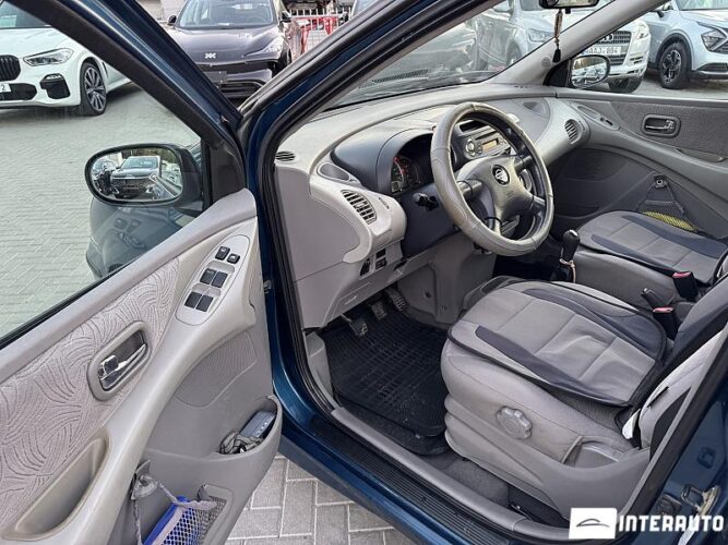 Nissan Almera Tino 38 interauto-car