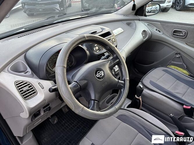 Nissan Almera Tino 41 interauto-car