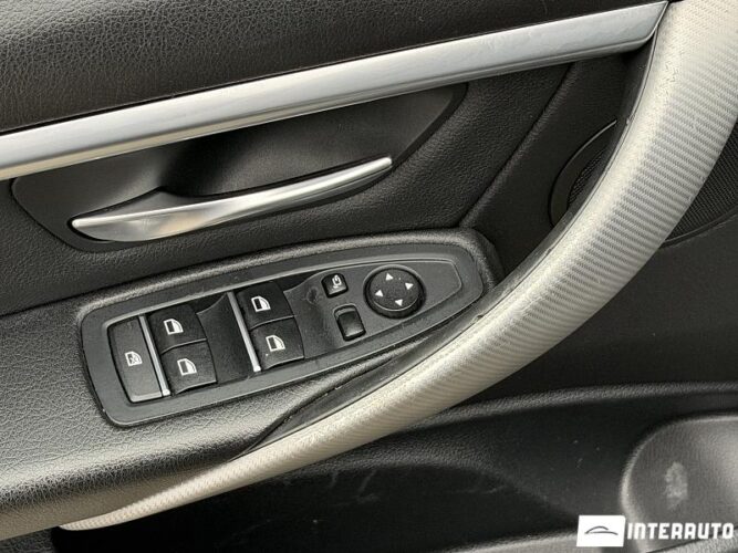 BMW 330E 38 interauto-car