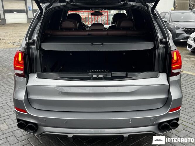 BMW X5 5.0i 56 interauto-car