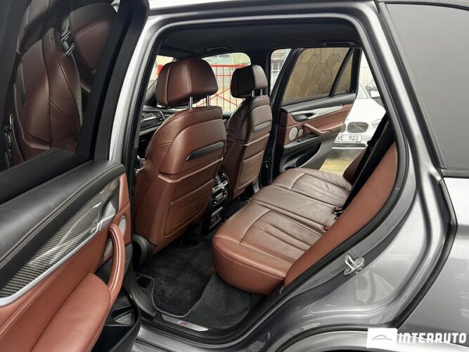 BMW X5 5.0i 55 interauto-car